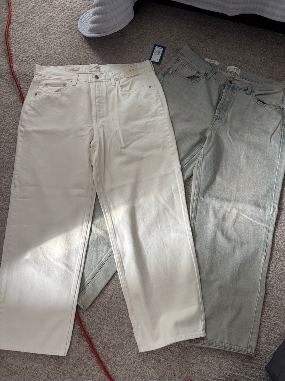 Woman’s White and Light Blue 90’s baggy jeans